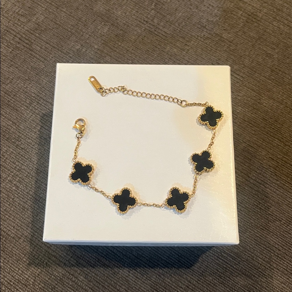 Elegant Black and Gold inspired Clover Bracelet.
